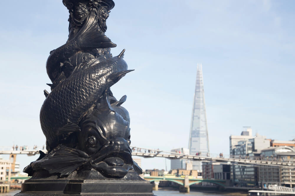 here is an image of the dolphin lamp statue which is an example of Victorian era architecture in london